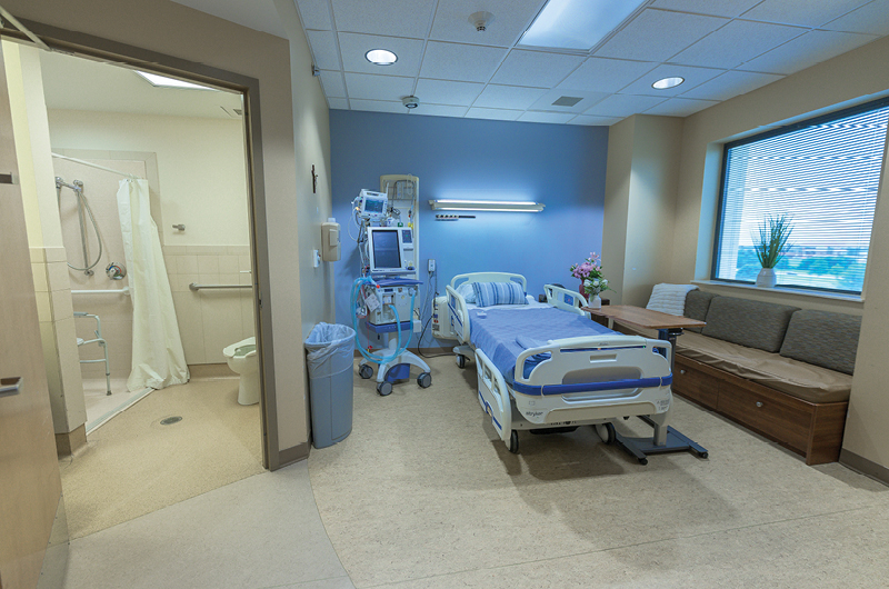 Patient bed and restroom